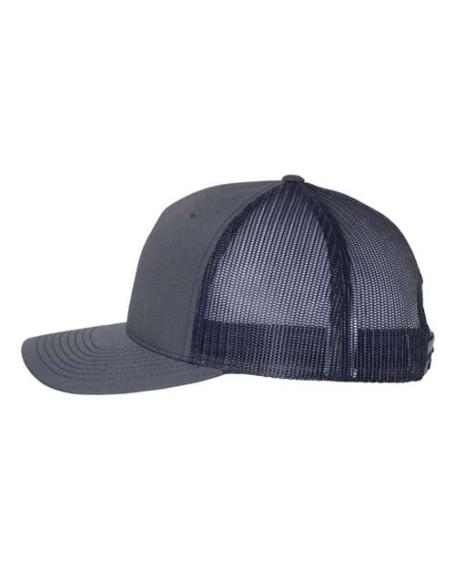 Richardson 112FP five-panel trucker hat in Ombre Blue/ Navy, angled side view.