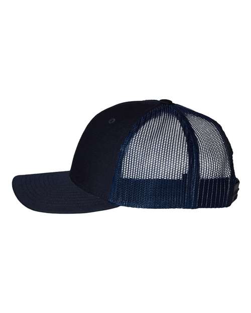 Richardson 112Y youth trucker hat in Navy, angled side view.