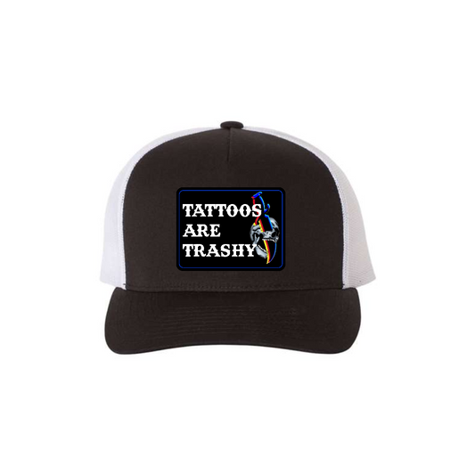 Tattoos Are Trashy Skull Blade 5-panel trucker hat in black with white mesh, front product mockup showing a black skull and blade design patch.