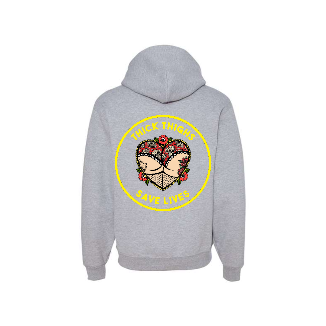 Athletic Heather Thick Thighs Save Lives graphic hoodie, back view showing the yellow circular slogan graphic.