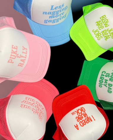 Trucker Hat Roulette assortment of colourful novelty trucker hats with humorous front designs.