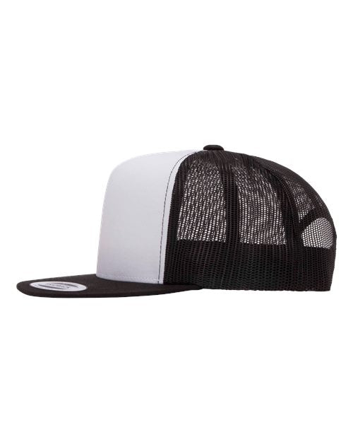 Yupoong 6006 flat brim trucker hat in Black/ White/ Black, angled side view.