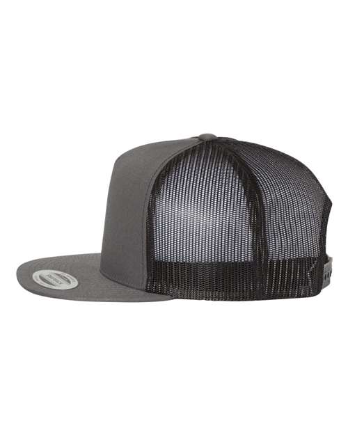Yupoong 6006 flat brim trucker hat in Charcoal/ Black, angled side view.
