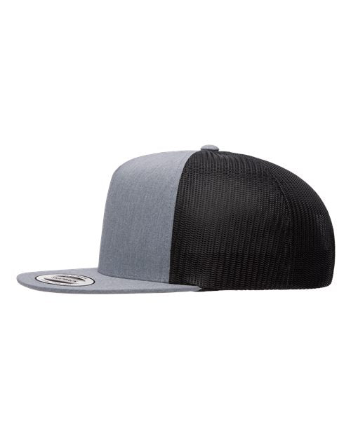 Yupoong 6006 flat brim trucker hat in Heather/ Black, angled side view.