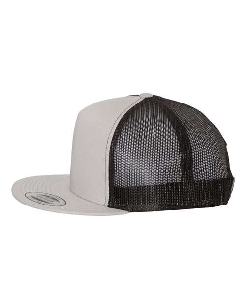 Yupoong 6006 flat brim trucker hat in Silver/ Black, angled side view.