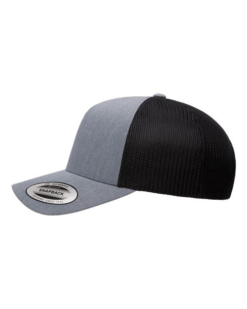 Yupoong 6506 trucker hat in Heather/ Black, angled side view.
