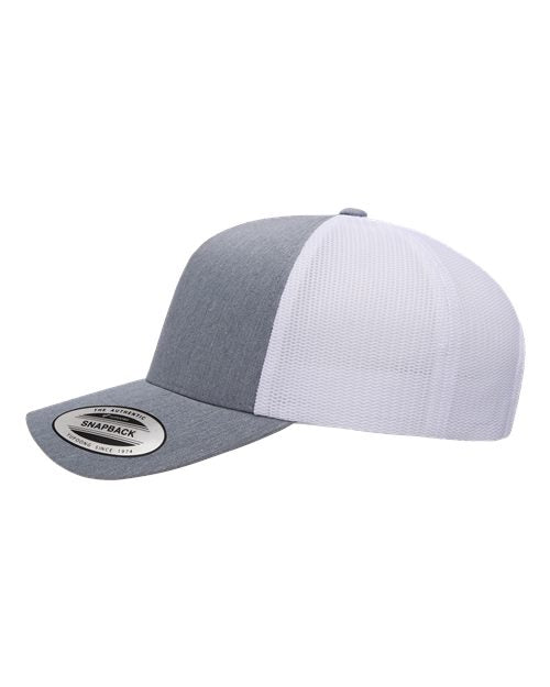 Yupoong 6506 trucker hat in Heather/ White, angled side view.