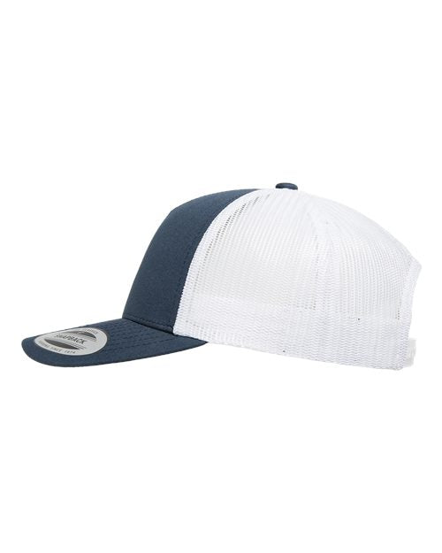 Yupoong 6506 trucker hat in Navy/ White, angled side view.