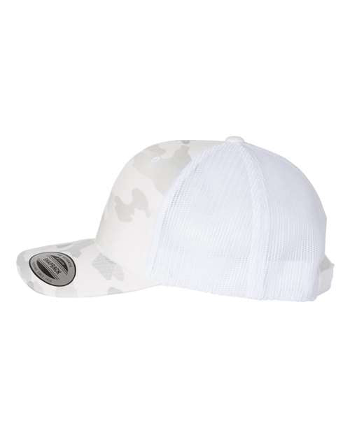 Yupoong 6606 snapback trucker hat in Multicam Alpine/ White, angled side view.