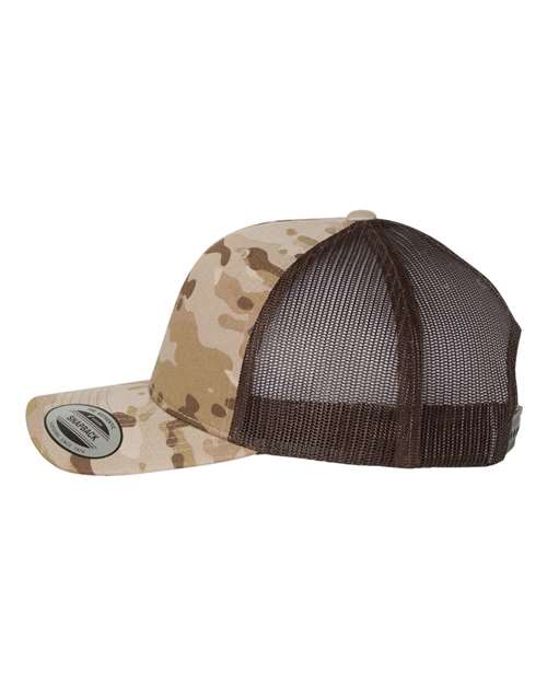 Yupoong 6606 snapback trucker hat in Multicam Arid/ Brown, angled side view.