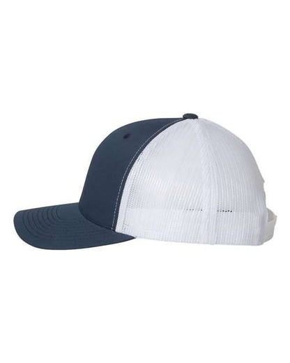 Yupoong 6606 snapback trucker hat in Navy/ White, angled side view.